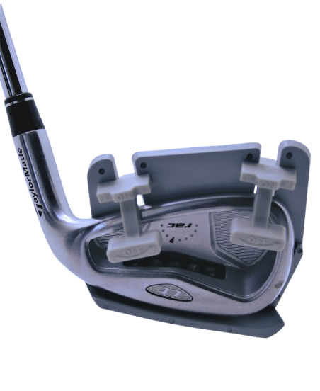 Club cover attached to the back of a golf iron using clamps